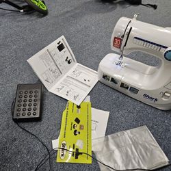 Sewing machine.  Working fine. See details below 