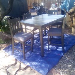 Table And Four Chairs Brand New Condition Antique Grayish Color