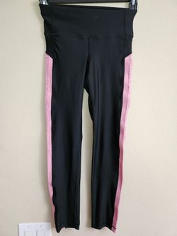 Under armor black & pink leggings size Extra small.
