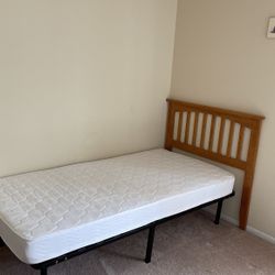 Two Twin size  Beds With headboards and matreses 