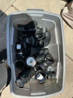 ABS DWV plumbing fittings—mostly 2”, 3”, and possibly 4” fittings (45s, 90s, wyes, couplings, cleanouts, reducers, adapters, and a few no-hub/Fernco-s