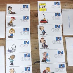 (2) Sets of 12 Peanuts USPS First Day Issue Stamped Envelopes
