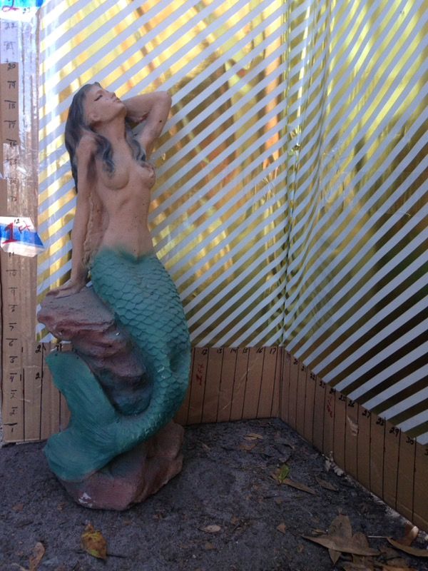 large outdoor mermaid statues