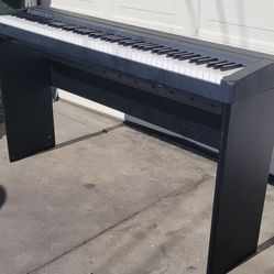 Yamaha Piano With Stand $120