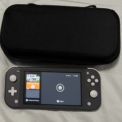 Nintendo Switch Lite, 4 Games, And Carrying Case