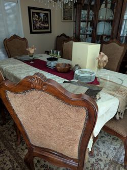 Wood table 8 chair set, and hutch very good quality