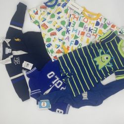 7 Designer Onesie Mostly New 