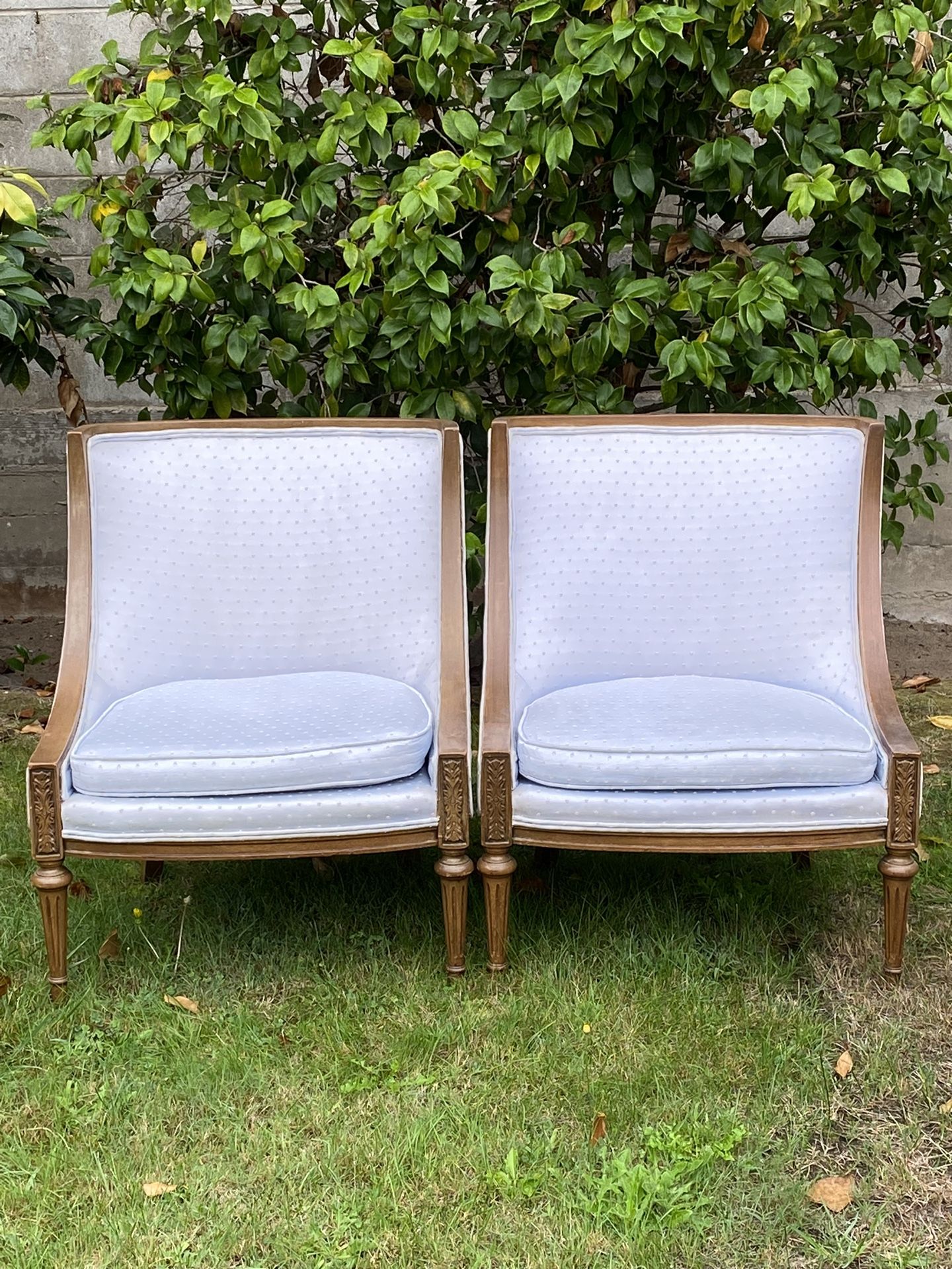 pair of vintage French-style carved wood armchairs Louis XVI revival or neoclassical
