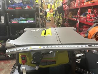 New Ryobi 10” table saw broken corner only asking $50 works great other that the big corner broken