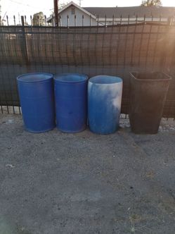 Blue tanks for sale special Father's Day 30 bucks one free trash can