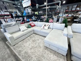 U-shaped fabric couch in light grey