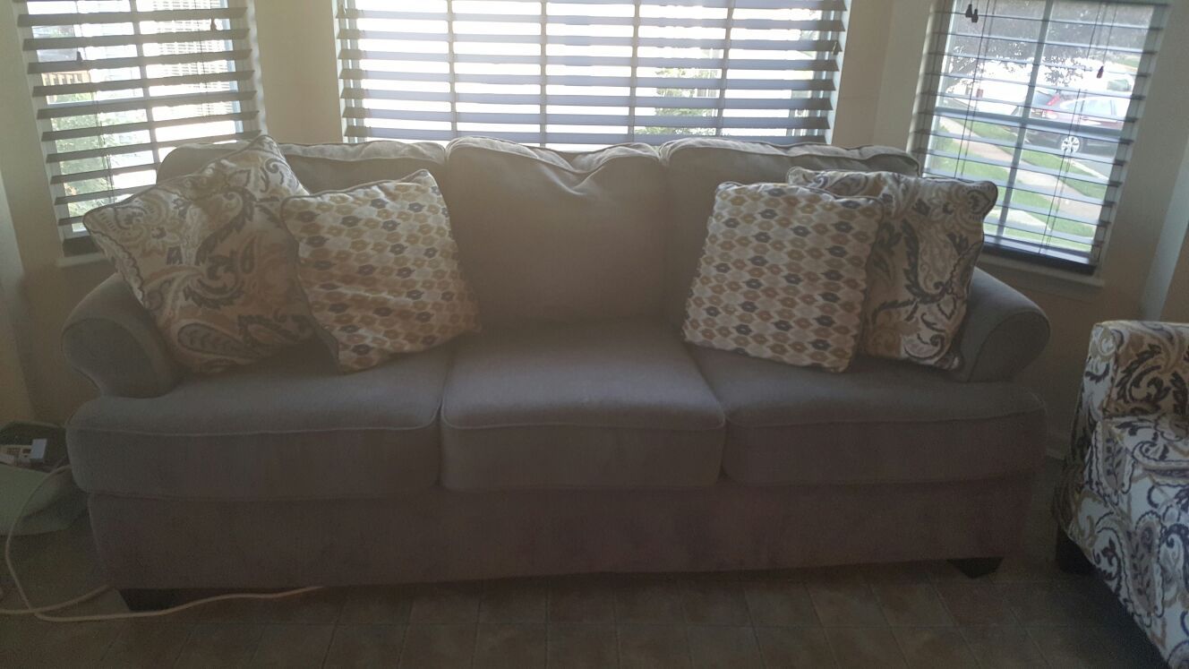 Ashley Furniture sofa and two chairs