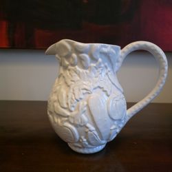 White Porcelain Pitcher with Embossed Grape and Vine Relief Decoration