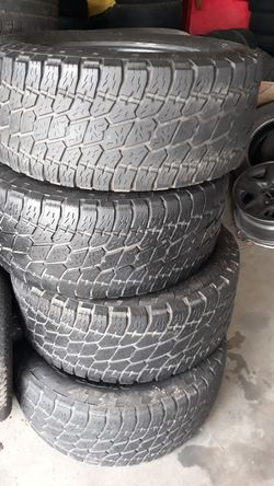 SET OF 325/60/18s 75% tread left