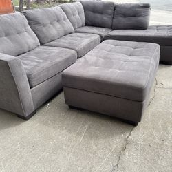 Gray Sectional W Matching Ottoman 