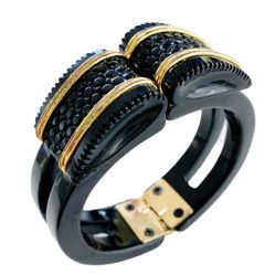 VINTAGE BLACK GOLD TONE ACCENT HINGED BRACELET