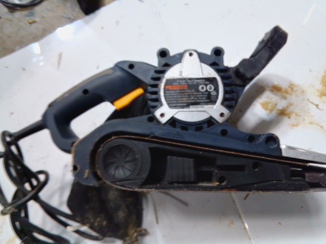 Chicago Electric belt sander, likely the 3" x 21" model.