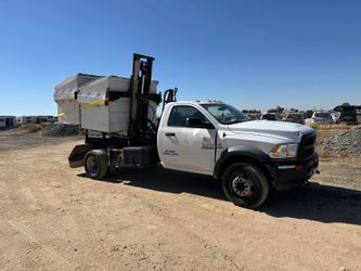 Dump truck dumpster bin container