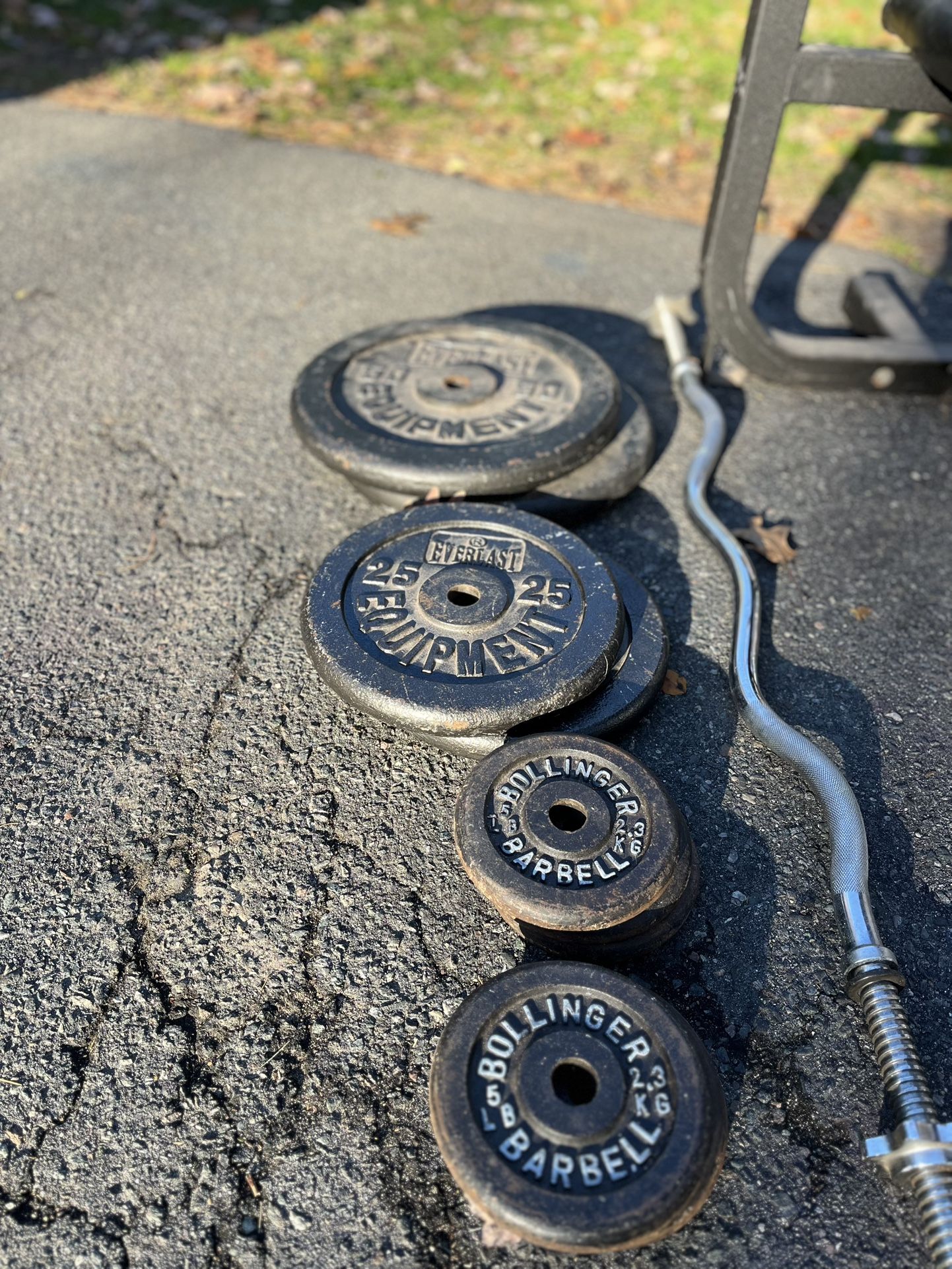 180 pounds 1” plates weights, bench and two bars 