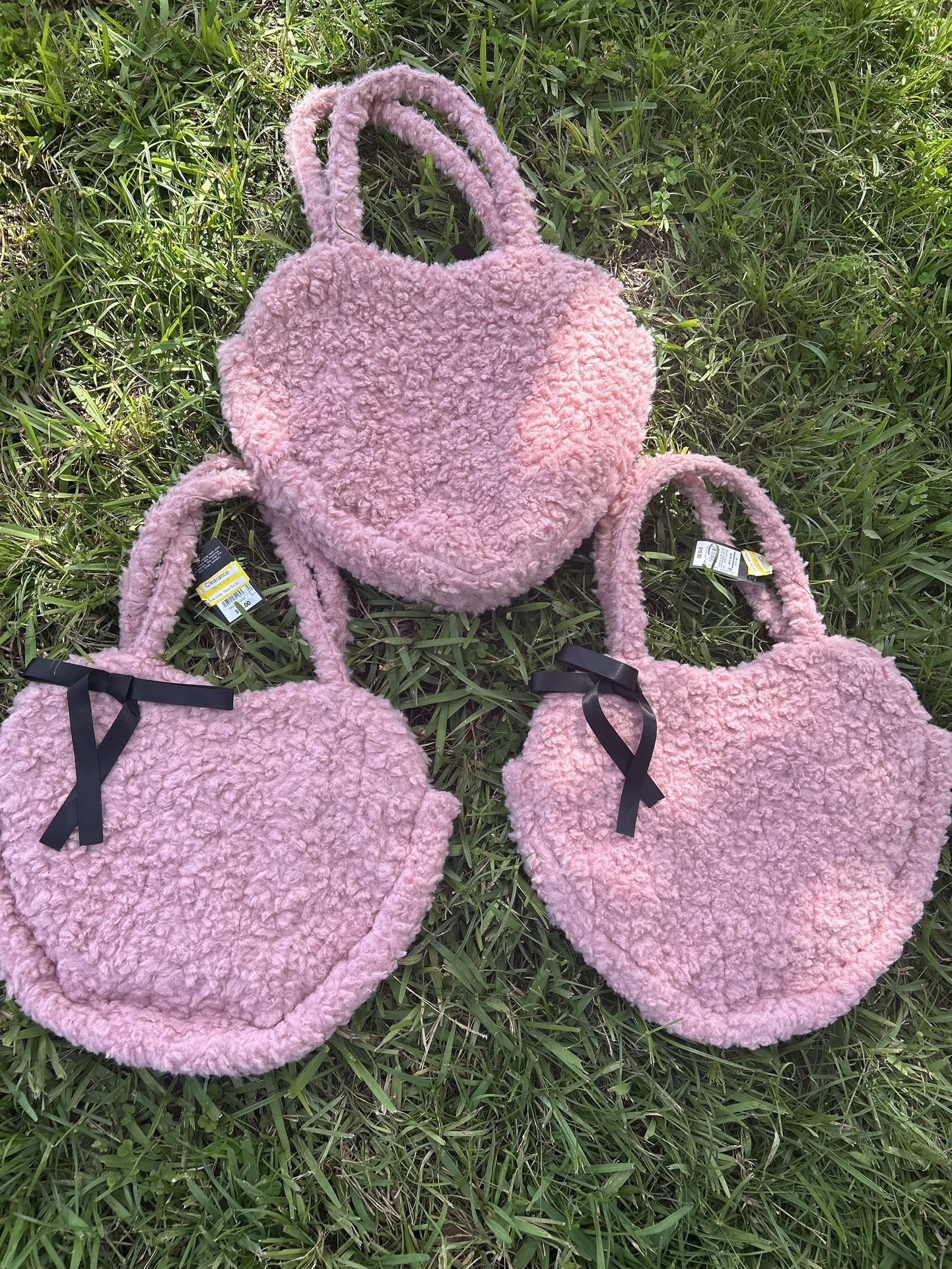 pink fuzzy heart-shaped bag