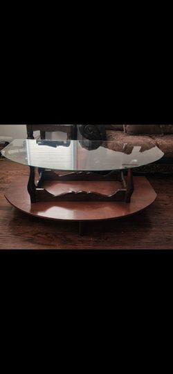 Upside-down glass top  table