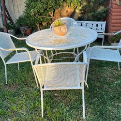 Set of  table , 4 chairs 
