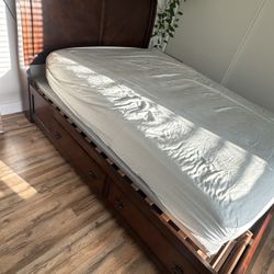 Queen sleigh bed with built in drawers