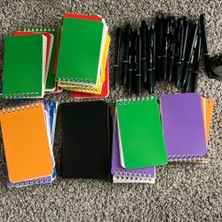 Sharpie pens and notebooks