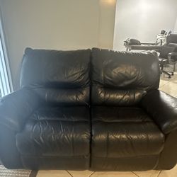 Leather reclining loveseat
