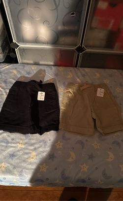 Black Three ShortsTan Three T-Shirts