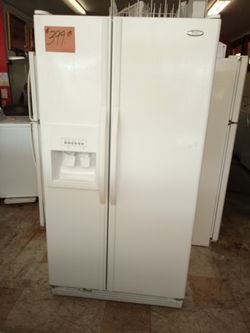 Whirlpool Side by Side Refrigerator White ex large excellent . Warranty . Delivery available . 2203 Fowler st. Ft. Myers 33901