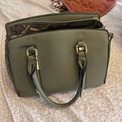 green purse with wallet