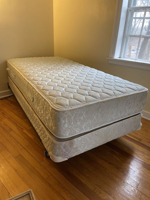 Twin Mattress and Box Spring on Wheeled Metal Trundle for Sale in