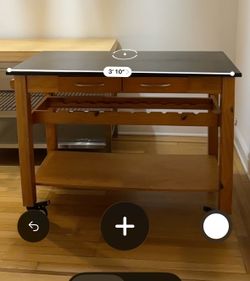 work bench/ island. Black marble top.