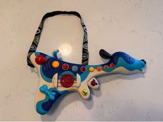 B. Toys Dog Guitar