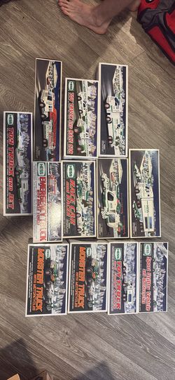 Collectible HESS Trucks 12 Total In Original Boxes