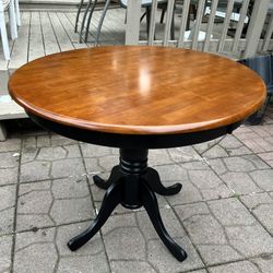 Round Black And Wood Dining Table