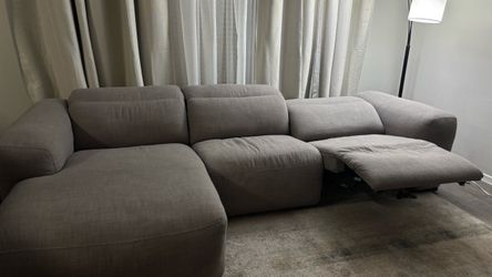 Sectional couch with leg rests