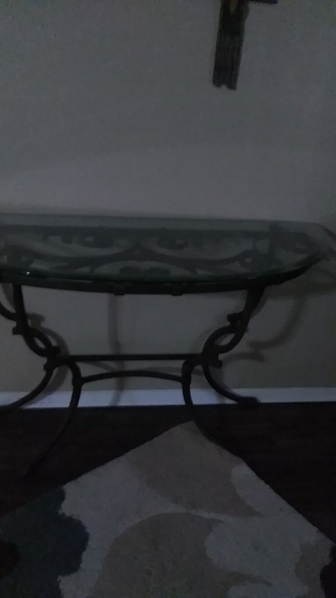 Glass top table with antique gold legs and trim