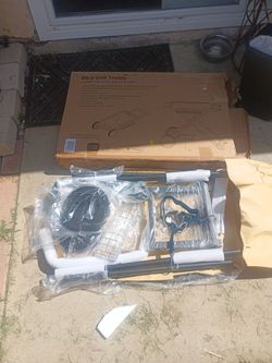 Barbecue grill trolley
