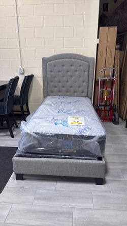 Twin bed with mattress and box spring