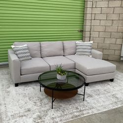 *Free Delivery* Gray Living Spaces Sectional Reversible Chaise
