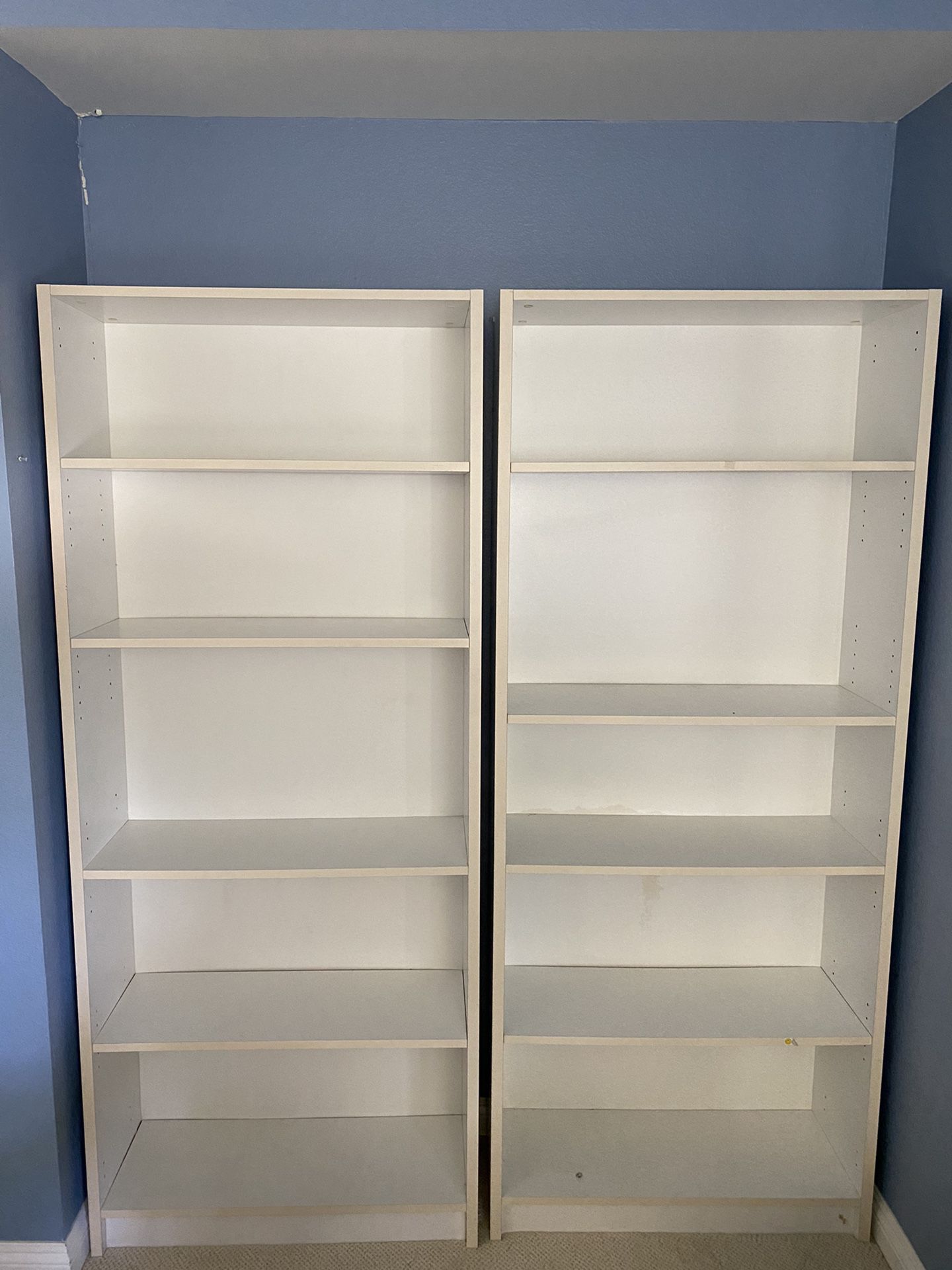 2 White bookshelves