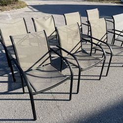 8 Stackable Metal Framed Patio Garden Sling Chairs! All sturdy, light cosmetic wear.  23x21x34in Seat Height 17in 
