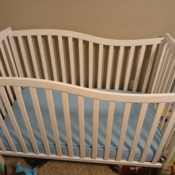5 in 1 Toddler Bed/ Crib Ashbury.  Comes with brand new Sealy mattress