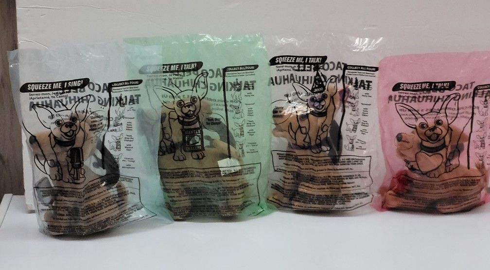 (Lot Of 4) New Sealed 2000 Different TACO BELL Plush CHIHUAHUAS Stuffed Animals. This lot contains four new and sealed stuffed animals from Taco Bell'