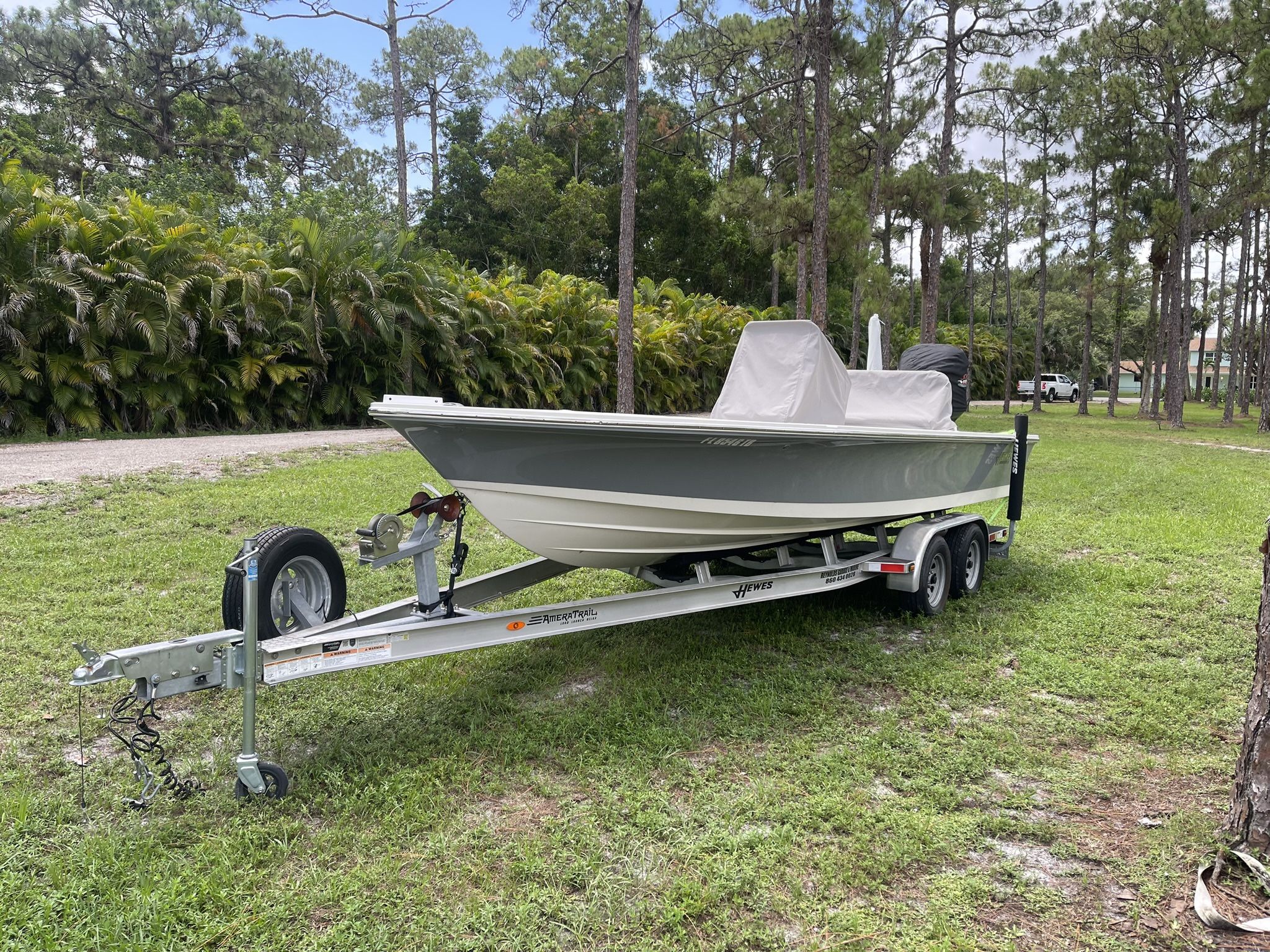 Like New 2021 Bob Hewes 21ft Redfisher Bay Boat. Only 40 Hours.