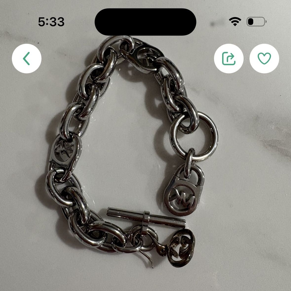Michael Kors silver tone bracelet.