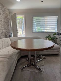 Midcentury wooden table with chrome base