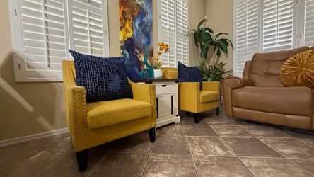 Beautiful Carocc accent chairs witnailheads and solid wood yellow lines